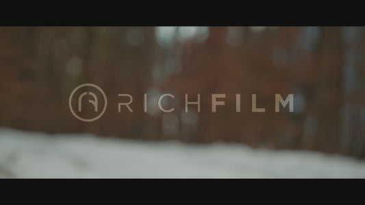 Shot of a mountain biker riding on a forest trail in winter