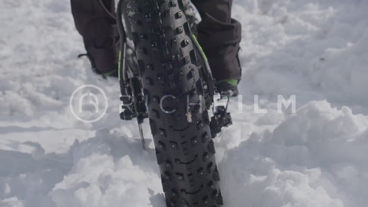 Close-up of a mountain bike tyre in winter - V2