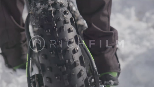 Close-up of a mountain bike tyre in winter - V2